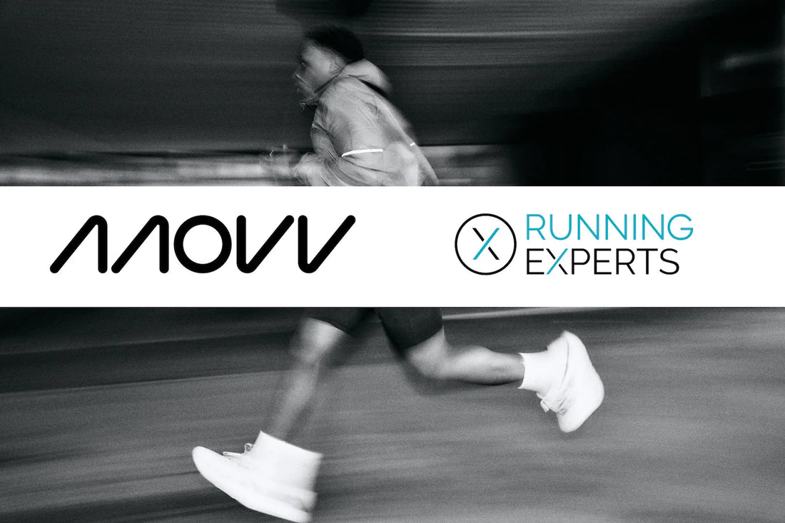 Black and white photo of a runner in motion wearing white and grey minimalistic running shoes for injury reduction