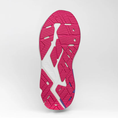 Close-up view of the pink and white rubber outsole of a running shoe, showing its textured tread pattern for grip and flexibility.